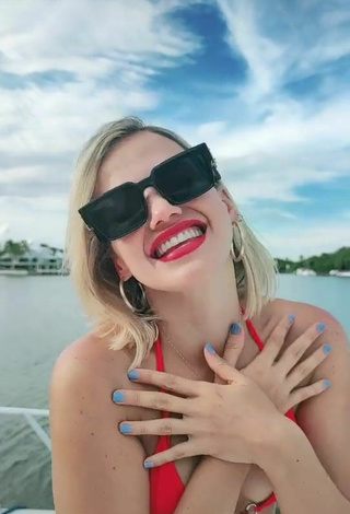 3. Hot Fanny Lu Shows Cleavage in Red Bikini Top on a Boat