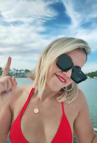 5. Hot Fanny Lu Shows Cleavage in Red Bikini Top on a Boat