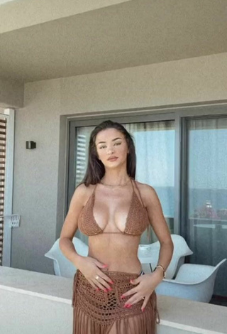 4. Sexy FashionNova Shows Cleavage in Brown Bikini Top in the Sea