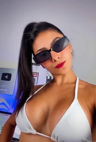 5. Erotic Isadora Nogueira Shows Cleavage in White Bikini Top