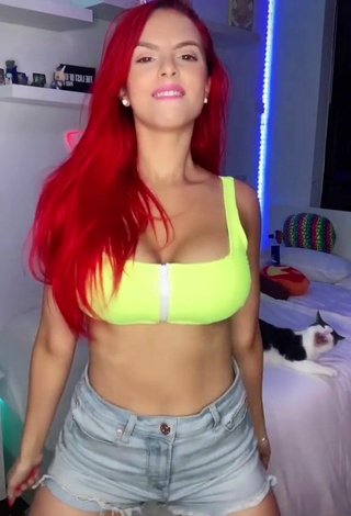 3. Sweetie Jenny Devil Shows Cleavage in Lime Green Crop Top