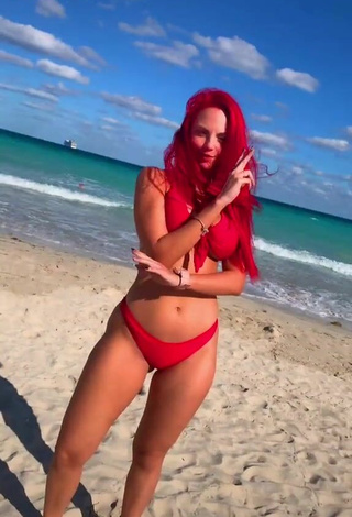 2. Sexy Jenny Devil Shows Cleavage in Red Bikini at the Beach