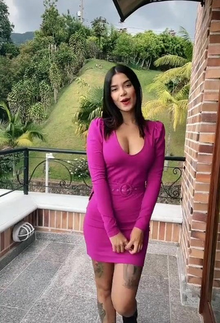 Sexy Jenn Muriel Shows Cleavage in Pink Dress on the Balcony