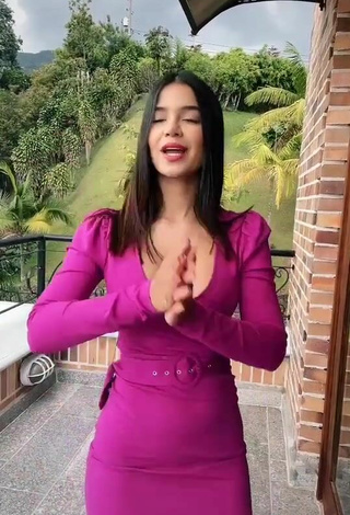 4. Sexy Jenn Muriel Shows Cleavage in Pink Dress on the Balcony