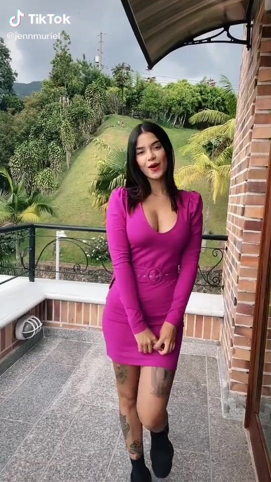 Sexy Jenn Muriel Shows Cleavage In Pink Dress On The Balcony Sexyfilter Com