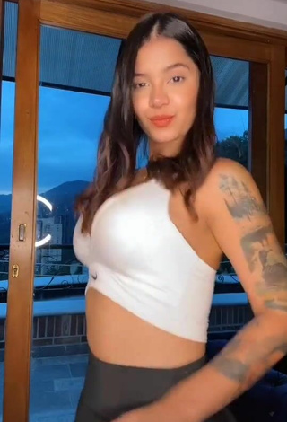 3. Hot Jenn Muriel Shows Cleavage in White Crop Top