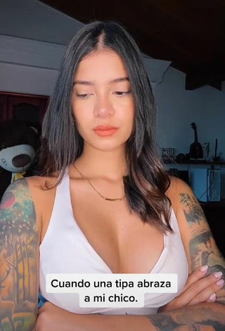 3. Sexy Jenn Muriel Shows Cleavage in White Crop Top