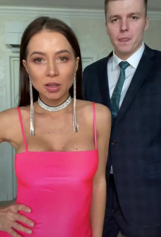 Sexy Lerchek Shows Cleavage in Pink Dress
