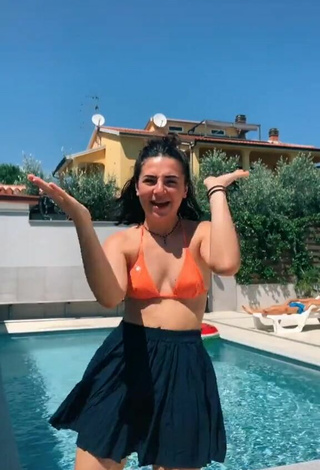 2. Sexy Ludovica Olgiati in Orange Bikini Top at the Pool