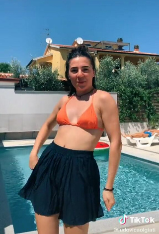 3. Sexy Ludovica Olgiati in Orange Bikini Top at the Pool