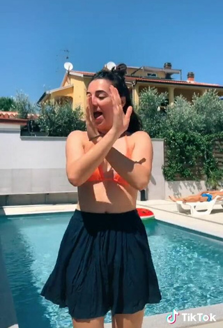 4. Sexy Ludovica Olgiati in Orange Bikini Top at the Pool