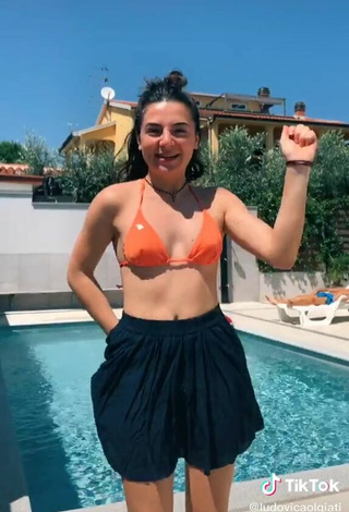 5. Sexy Ludovica Olgiati in Orange Bikini Top at the Pool