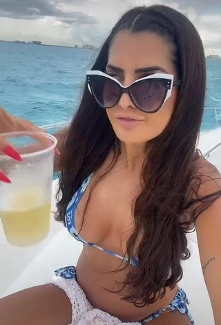 Adorable Marina Ferrari Shows Cleavage in Seductive Bikini on a Boat