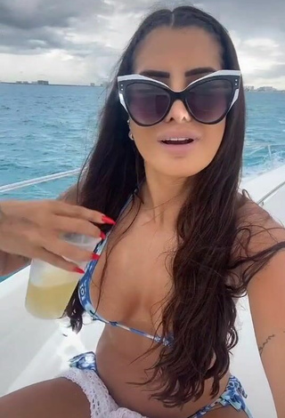 2. Adorable Marina Ferrari Shows Cleavage in Seductive Bikini on a Boat