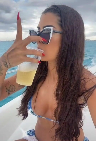 4. Adorable Marina Ferrari Shows Cleavage in Seductive Bikini on a Boat