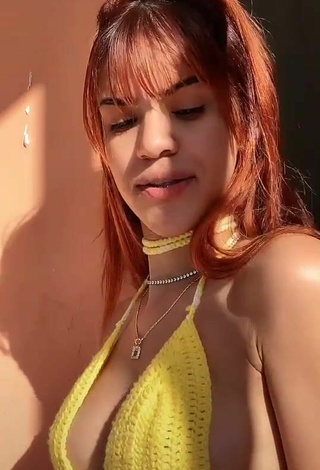 2. Sexy Melissa Rodriguez Shows Cleavage in Yellow Top