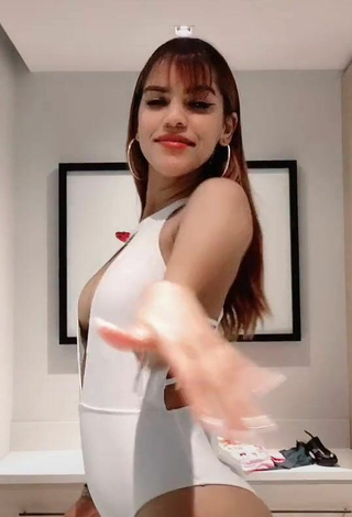 3. Sexy Melissa Rodriguez Shows Cleavage in White Swimsuit