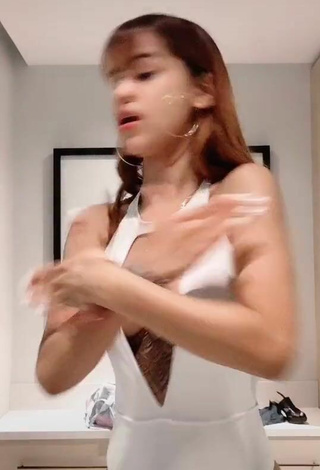 5. Sexy Melissa Rodriguez Shows Cleavage in White Swimsuit
