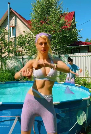 Sexy Anastasiya Vasina Shows Cleavage in White Bikini Top at the Pool