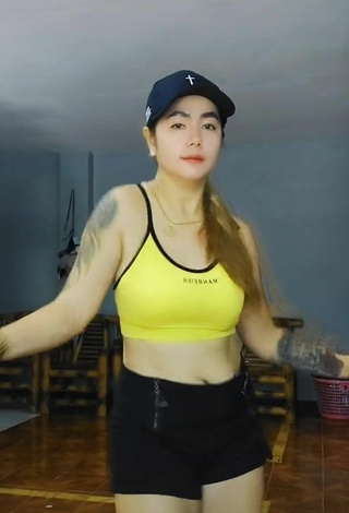 5. Sexy Roxanne Timbas in Yellow Crop Top
