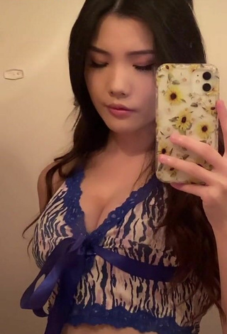 Sexy Tinna Fang Shows Cleavage in Crop Top