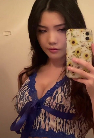 2. Sexy Tinna Fang Shows Cleavage in Crop Top