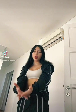 Sexy Nicki Nicole Shows Cleavage in White Crop Top