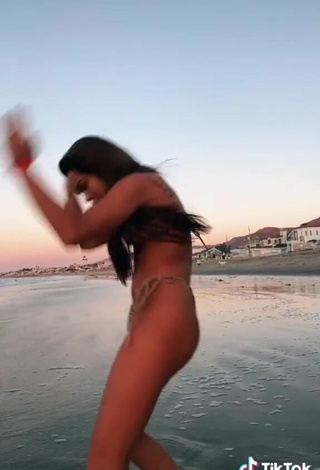 4. Sweetie Giulia Amato Shows Cleavage in Bikini at the Beach