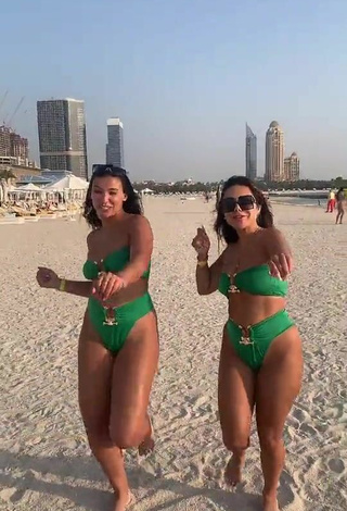 2. Cute Nourhène Shows Cleavage in Green Bikini at the Beach