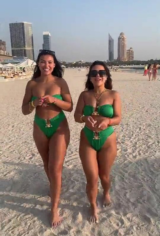 3. Cute Nourhène Shows Cleavage in Green Bikini at the Beach
