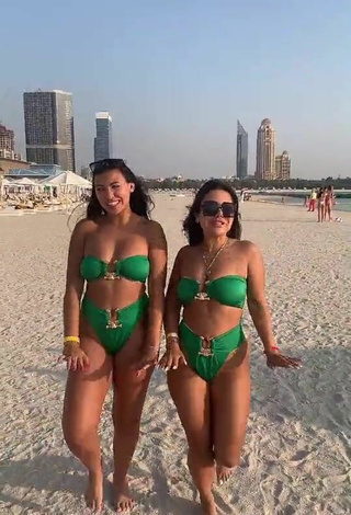 4. Cute Nourhène Shows Cleavage in Green Bikini at the Beach