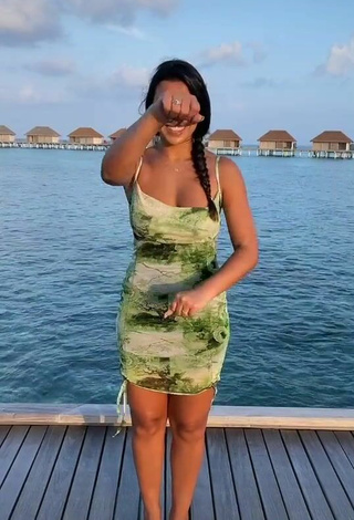 4. Hot Nourhène Shows Cleavage in Dress in the Sea