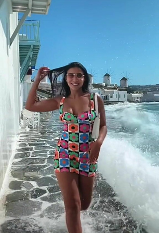 2. Sexy Nourhène Shows Cleavage in Dress in the Sea