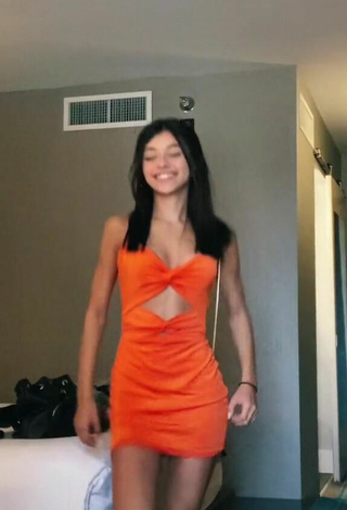 1. Hot Rachel Brockman in Orange Dress