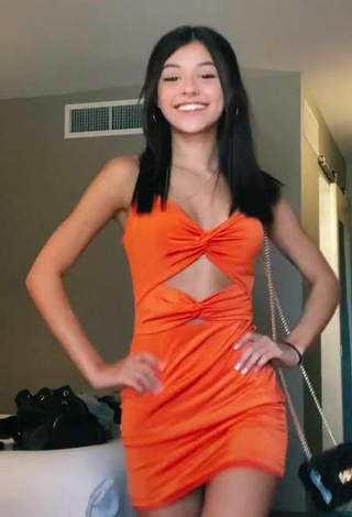 2. Hot Rachel Brockman in Orange Dress