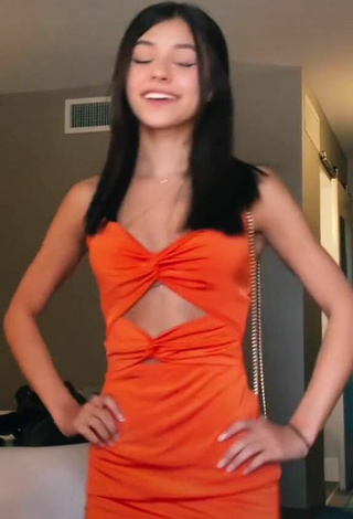 4. Hot Rachel Brockman in Orange Dress