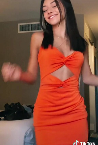 5. Hot Rachel Brockman in Orange Dress