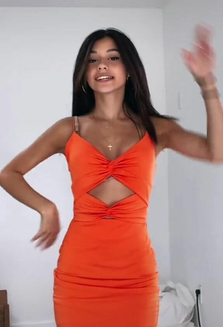 2. Sexy Rachel Brockman Shows Cleavage in Orange Dress