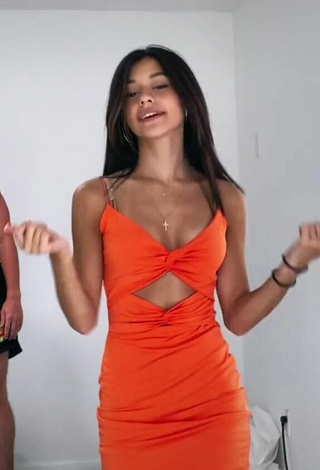 4. Sexy Rachel Brockman Shows Cleavage in Orange Dress