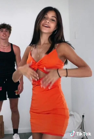 5. Sexy Rachel Brockman Shows Cleavage in Orange Dress
