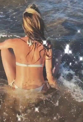 4. Hottie Sara Damnjanović Shows Cleavage in White Bikini in the Sea and Bouncing Boobs