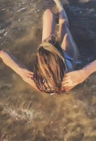 5. Hottie Sara Damnjanović Shows Cleavage in White Bikini in the Sea and Bouncing Boobs
