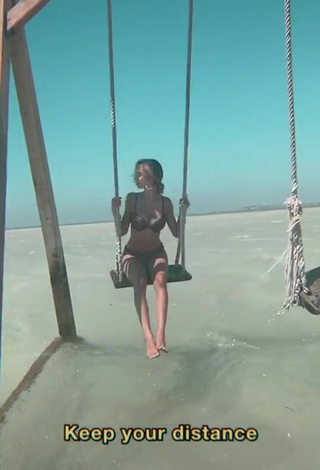 4. Sexy Sara Damnjanović in Leopard Bikini in the Sea