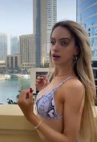 2. Beautiful Sara Damnjanović Shows Cleavage in Sexy Snake Print Bikini at the Pool