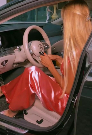 4. Sexy Sara Damnjanović in Pink Overall in a Car