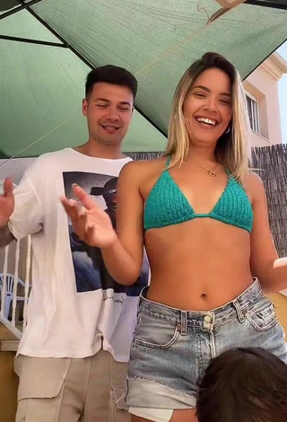 5. Hottie Andrea Mengual Shows Cleavage in Green Bikini Top