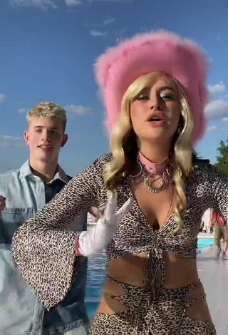 2. Hot Bad Barbie Shows Cleavage in Leopard Crop Top