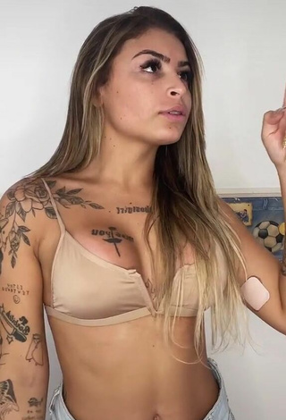 2. Sweetie Bárbara Shows Cleavage in Beige Bikini Top