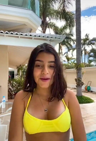 2. Cute Bela Almada Shows Cleavage in Yellow Bikini Top and Bouncing Boobs