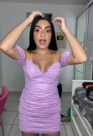 2. Beautiful Bela Almada Shows Cleavage in Sexy Purple Dress and Bouncing Breasts